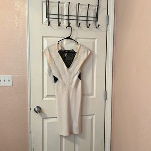 White Bebe dress with black lace backing. Always dry cleaned, smoke-free home.